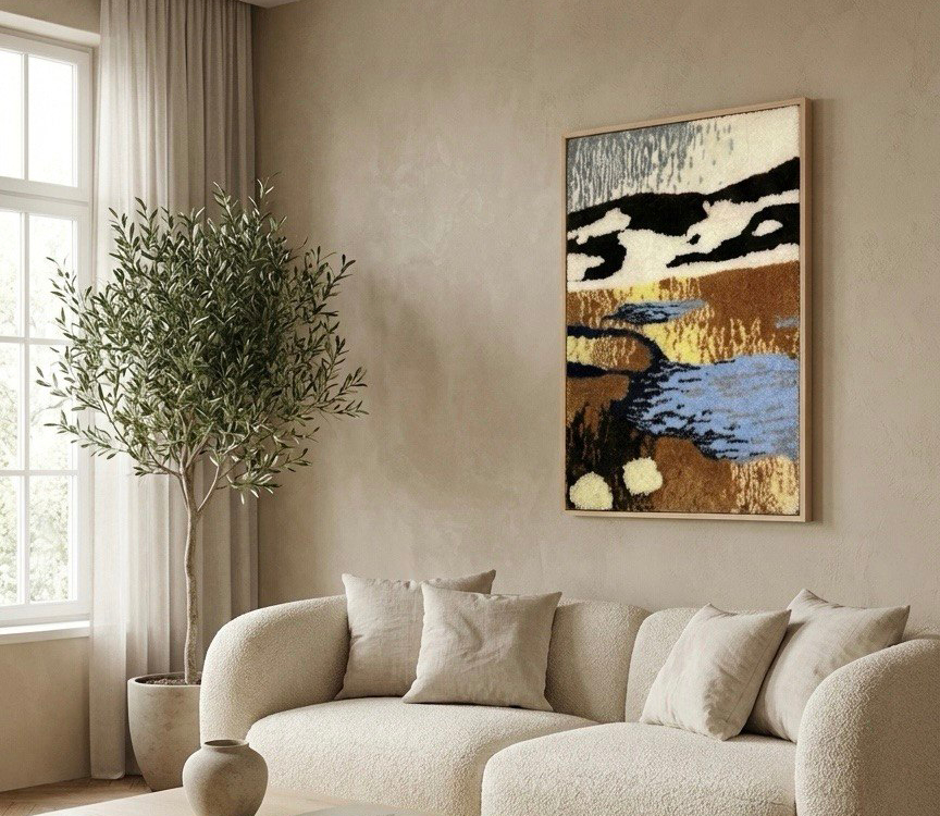 Minimalist architectural interior with textile artwork